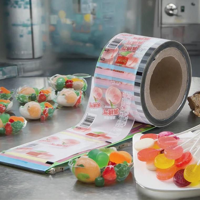 Percetakan Custom Sachet Packaging Roll Film Food Grade Pe Bopp Candy Lollipop Chocolate Food Auto-Packing Roll Film